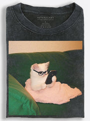Cozy Retro Bookworm Kitten Reading on a Velvet Green Sofa Vintage Washed T-Shirt
