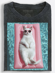 Playful Summer Cat Sunbathing on a Pink Pool Float Vintage Washed T-Shirt