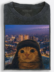 Dreamlike Retro Traveler Cat Taking a Twilight Selfie Above a Mountain City Vintage Washed T-Shirt