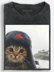Wide-Eyed Retro Soviet Cat Posing Beside a Tank in the Snow Vintage Washed T-Shirt