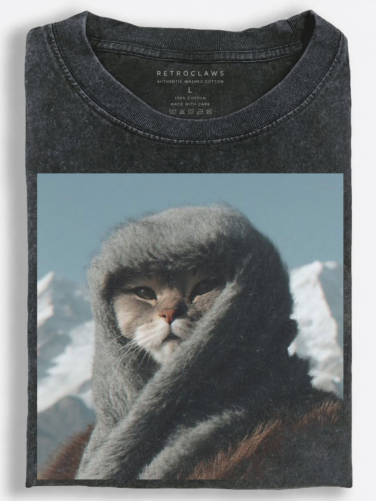 Cinematic Winter Cat Braving the Wind on a Snowy Mountain Vintage Washed T-Shirt